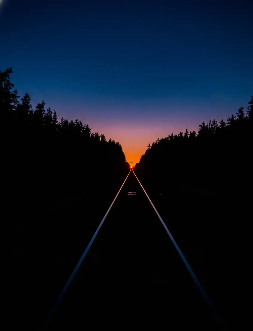 Minimal road at sunset with deep black surroundings, AMOLED black wallpaper 4K with strong contrast and dark tones